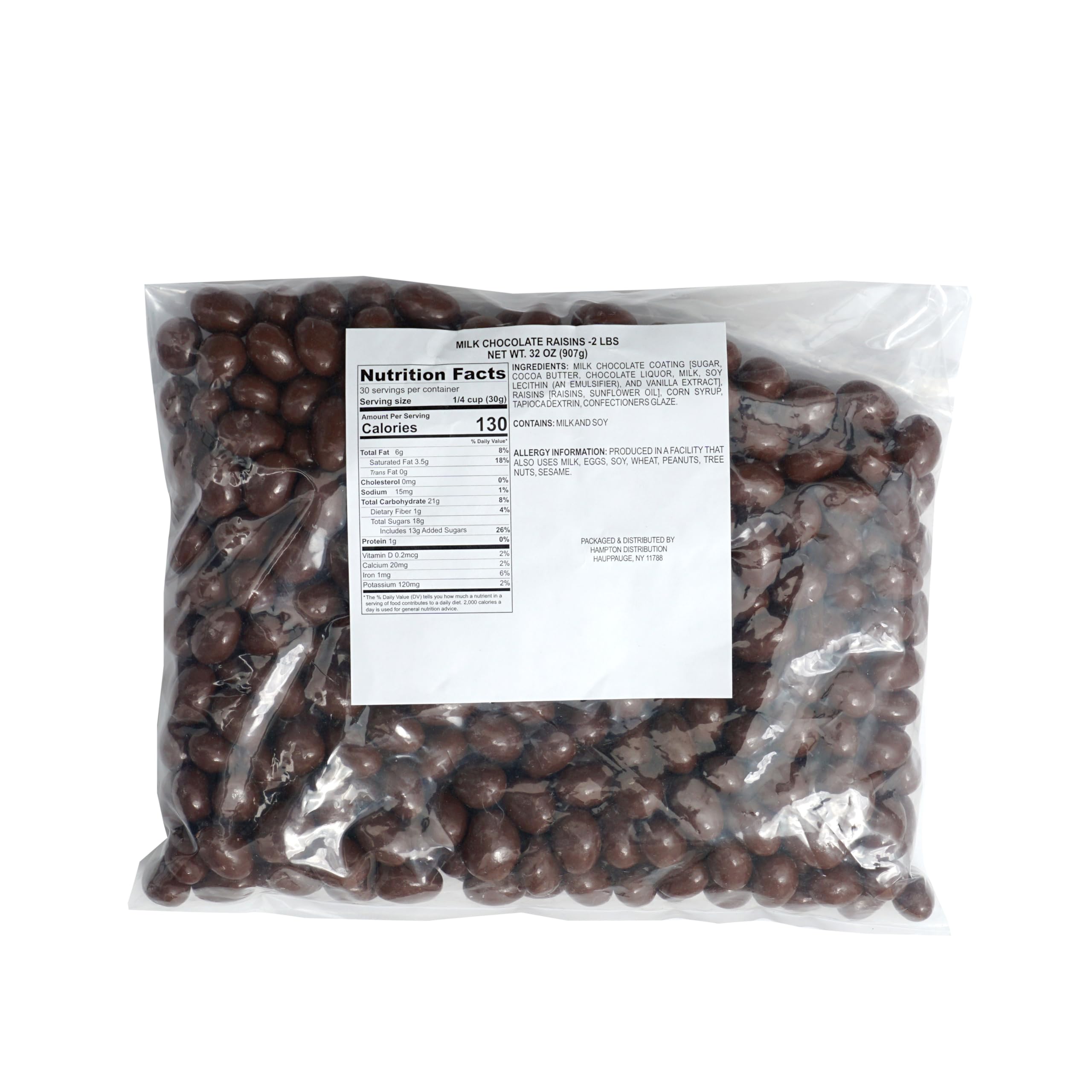 Close-up of The Hampton Candy Company milk chocolate drizzle on raisins for rich snacking.