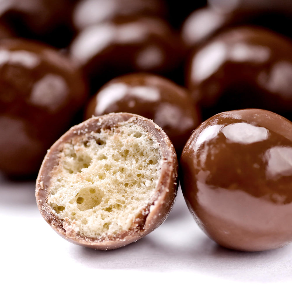 Party table setup with The Hampton Candy Company Milk Chocolate Malt Balls
