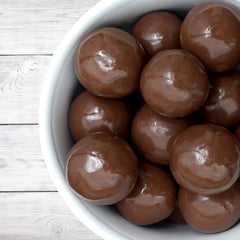Serving bowl with The Hampton Candy Company Milk Chocolate Malt Balls for snacking