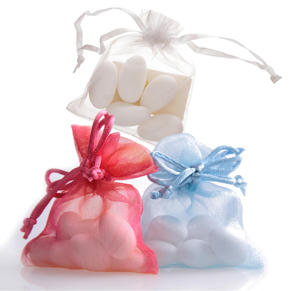 The Hampton Candy Company White Jordan Almonds displayed in a glass bowl for a festive setup.