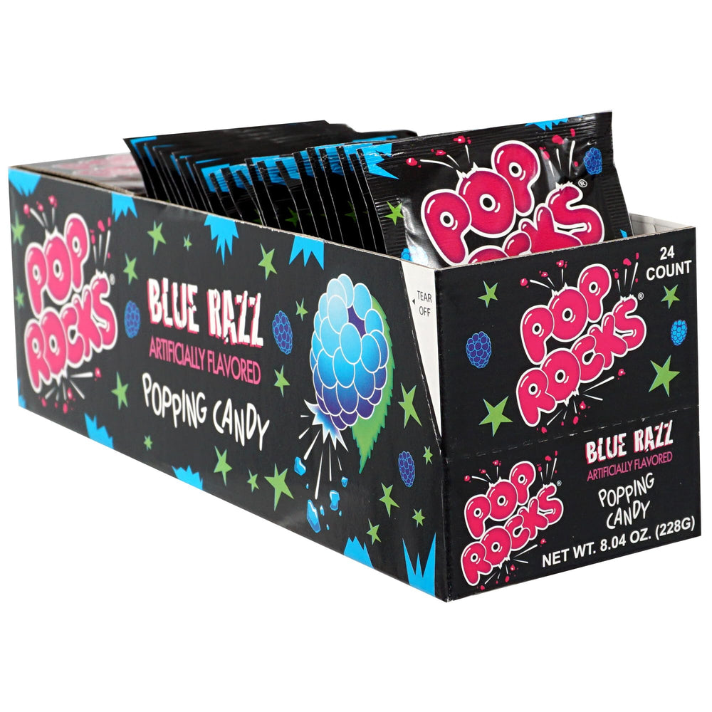 The Hampton Candy Company Pop Rocks Blue Razz on tongue delivering fizzy pops.
