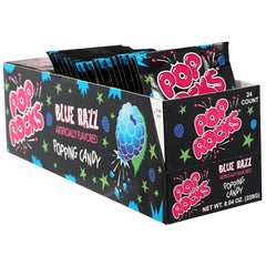 The Hampton Candy Company Pop Rocks Blue Razz on tongue delivering fizzy pops.