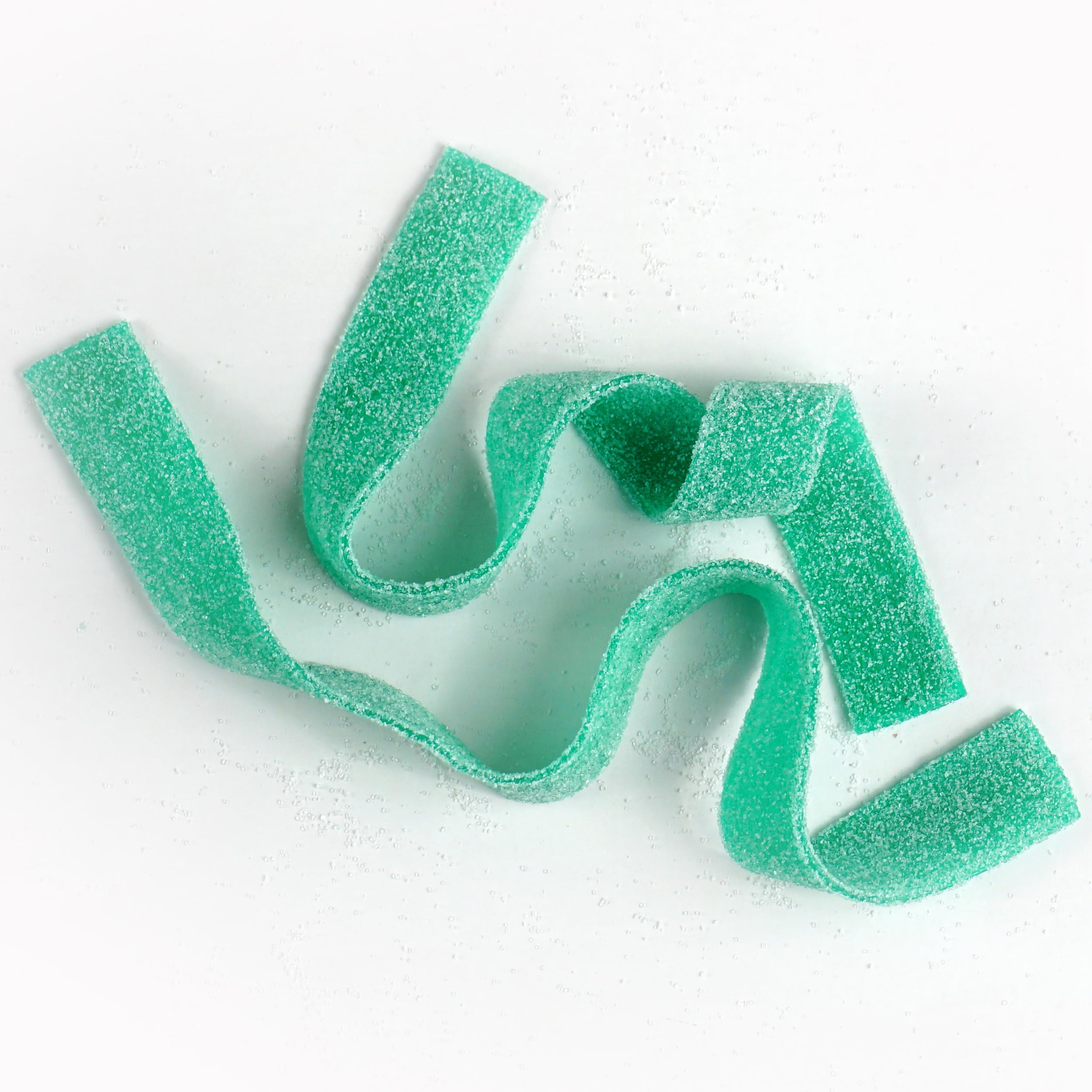 The Hampton Green Apple Sour Belts styled as party favors for events.