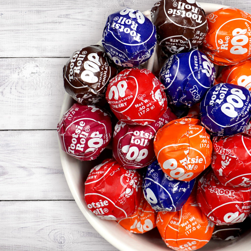 The Hampton Popcorn Company Tootsie Roll Pops grape flavor, kid-friendly party treat.