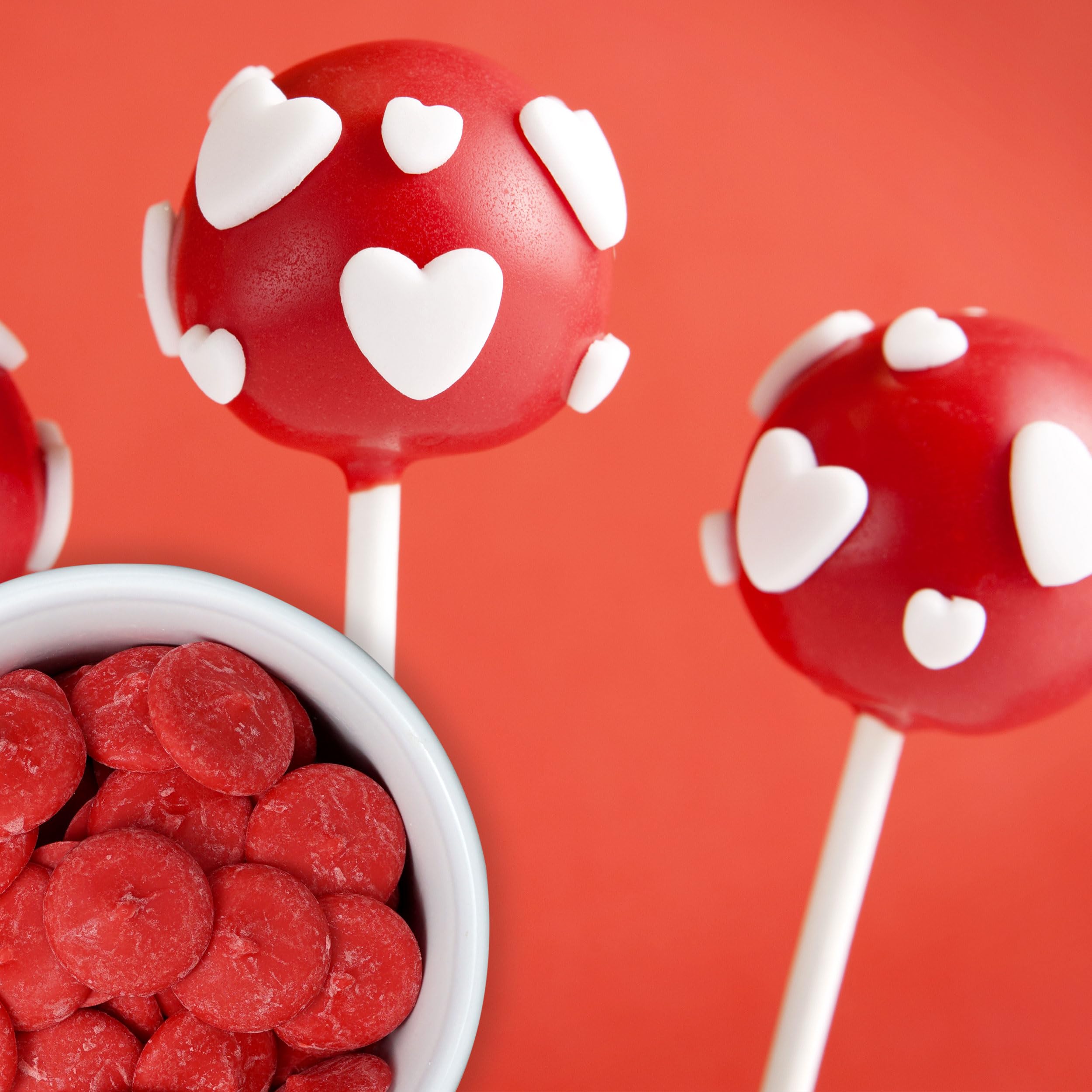 Sundae topping or drizzle: Red Chocolate Wafers coating popcorn with shimmer.