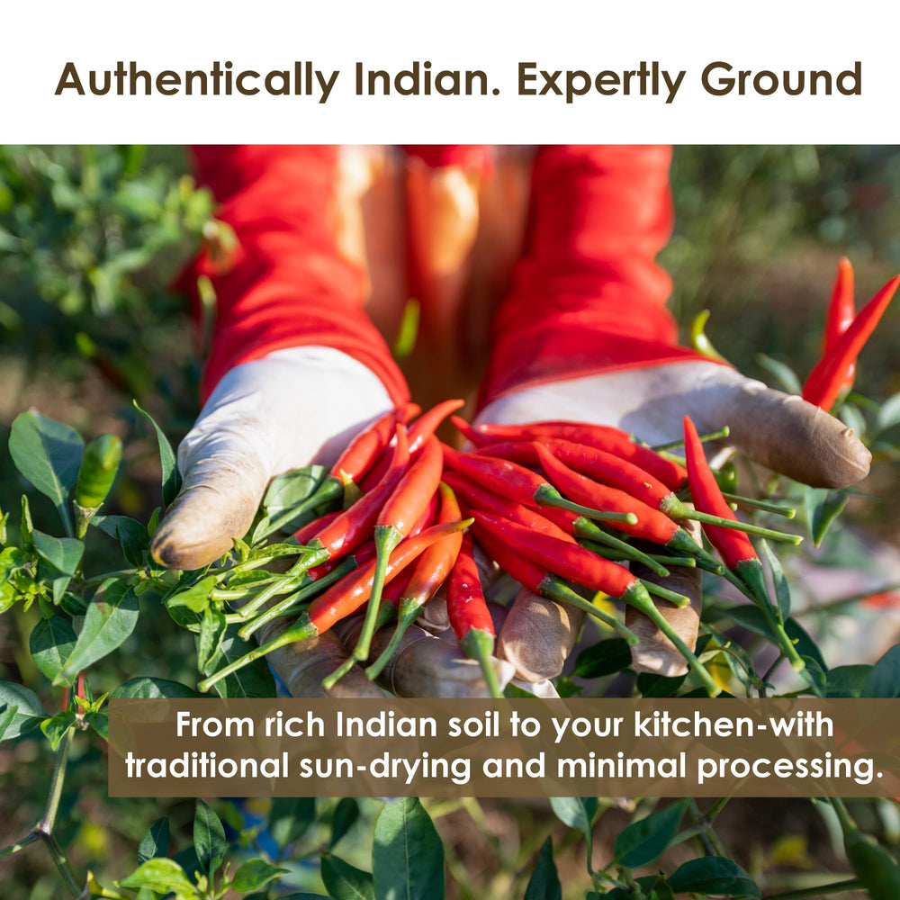 The Holly Tree Organic Cayenne Pepper Powder ground grains sprinkled on a surface.