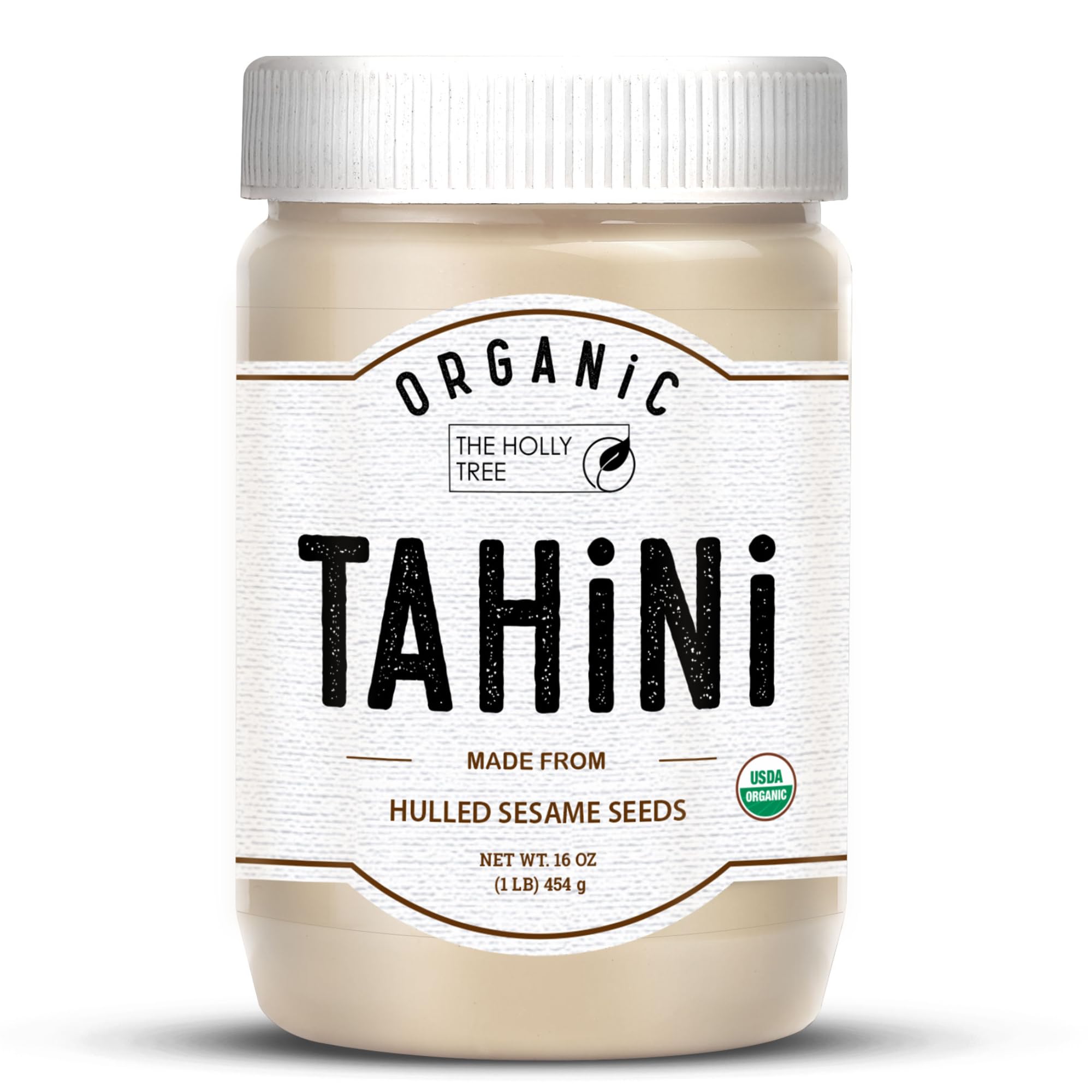 The Holly Tree Organic Tahini Paste bottle shows a smooth, creamy sesame base for dressings.