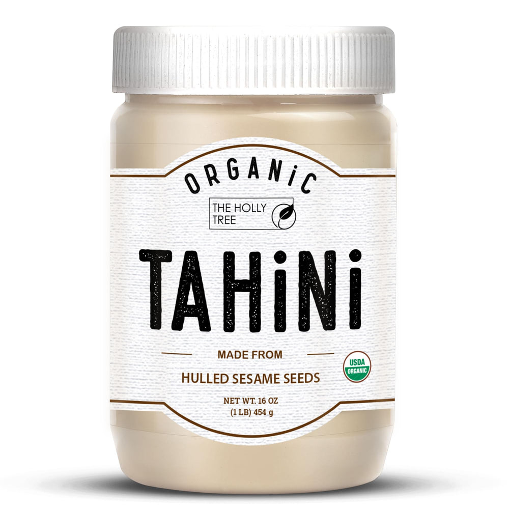 The Holly Tree Organic Tahini Paste bottle shows a smooth, creamy sesame base for dressings.