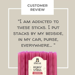 Raspberry honey stick drizzle into tea for natural flavor boost.