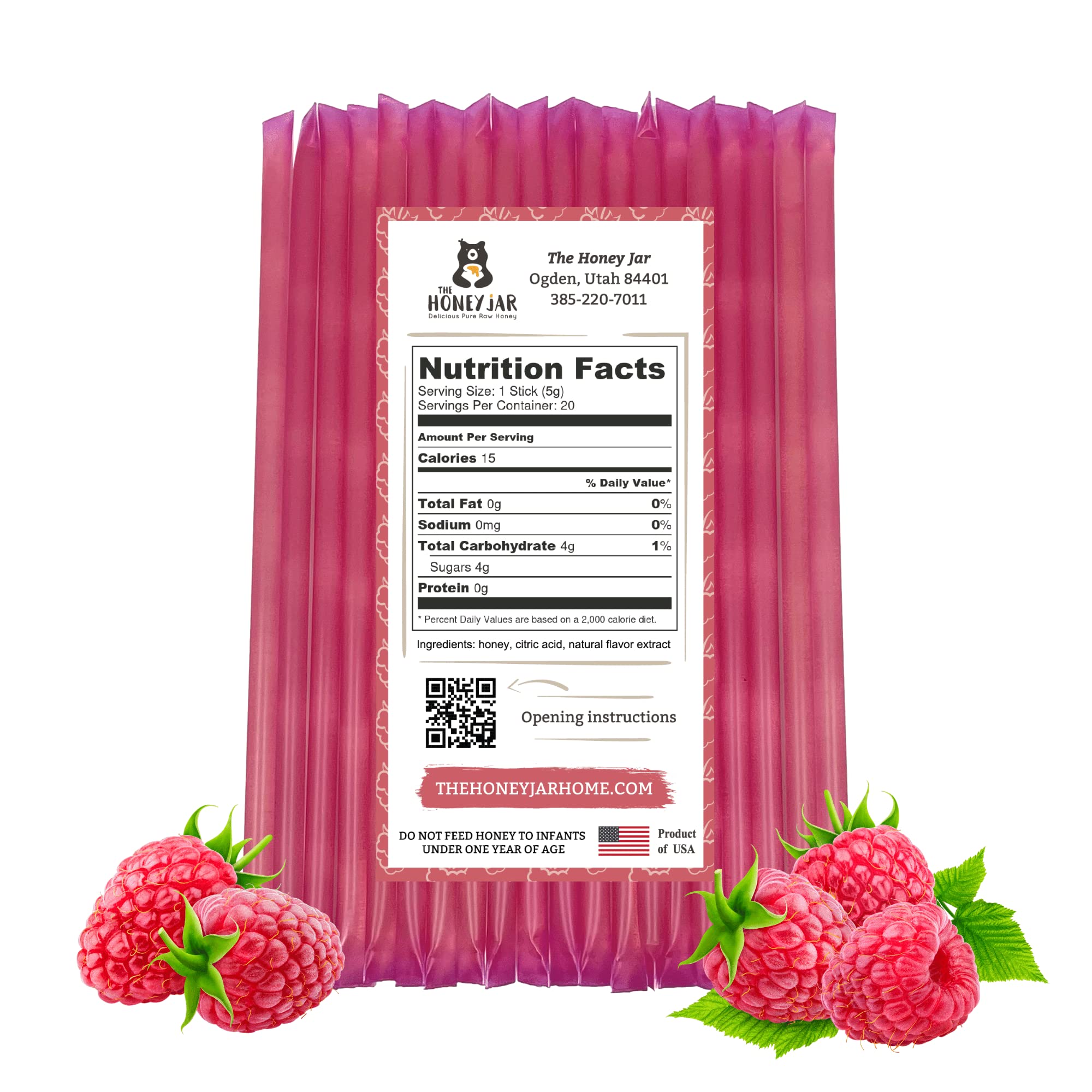 The Honey Jar raspberry honey stick ready to squeeze into a cup of tea.