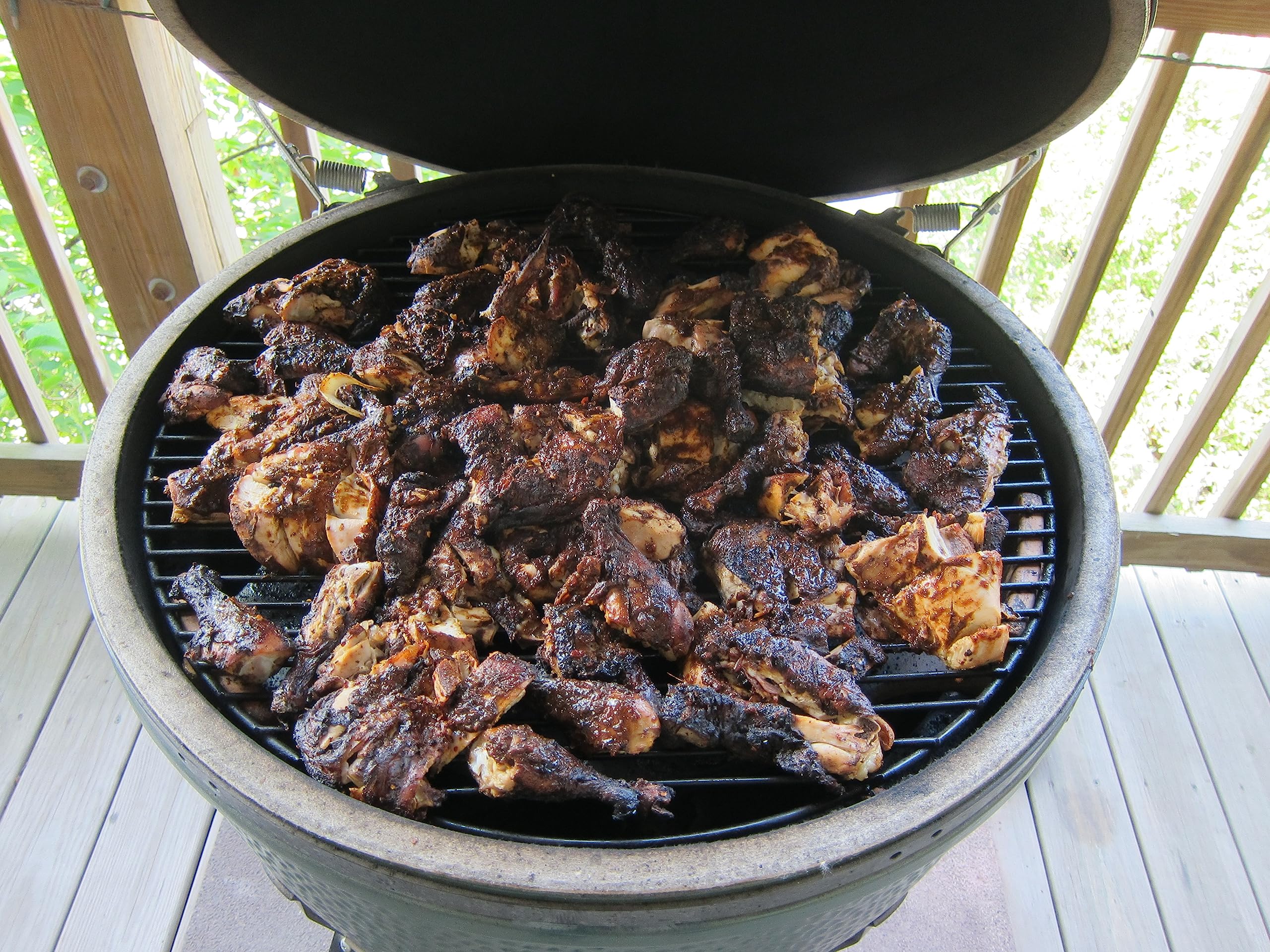 The Jerk Man seasoning on chicken before grilling.