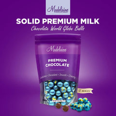 The Madelaine World Globe Balls foil wrapper with world map detail adds festive appeal.