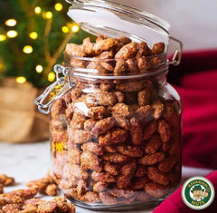 The Magic Bavarian Nuts cinnamon roasted almonds served in a bowl, ideal for gatherings.