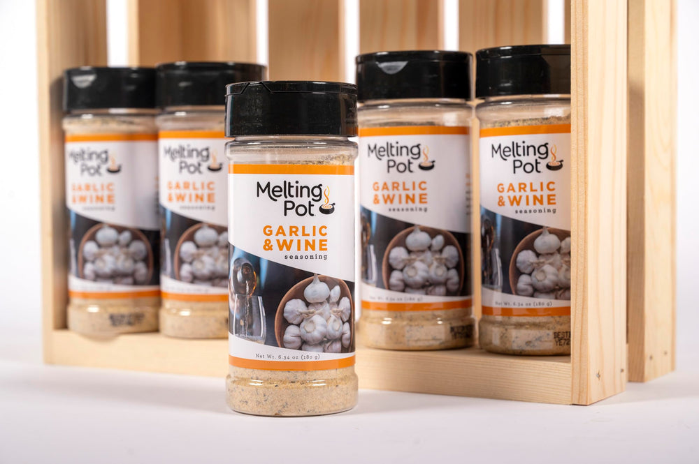 Close-up of The Melting Pot seasoning jar reveals real garlic and herbs.