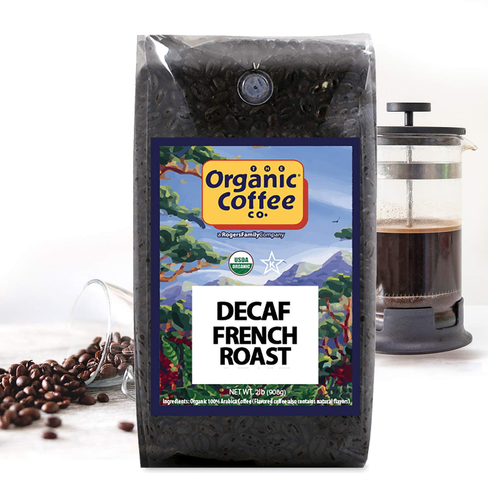 The Organic Coffee Co. decaf French roast beans closeup reveals rich aromas for grinding readiness.