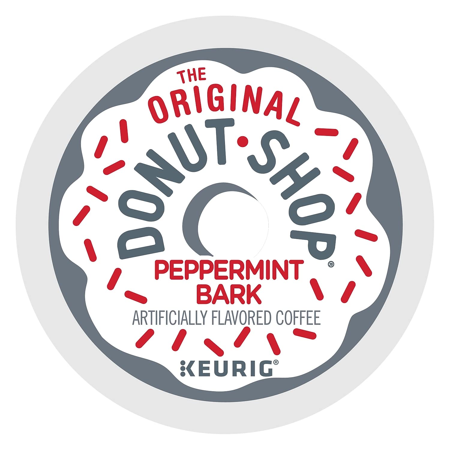 The Original Donut Shop Peppermint Bark K-Cup pods close-up, showcasing creamy white chocolate and peppermint notes.