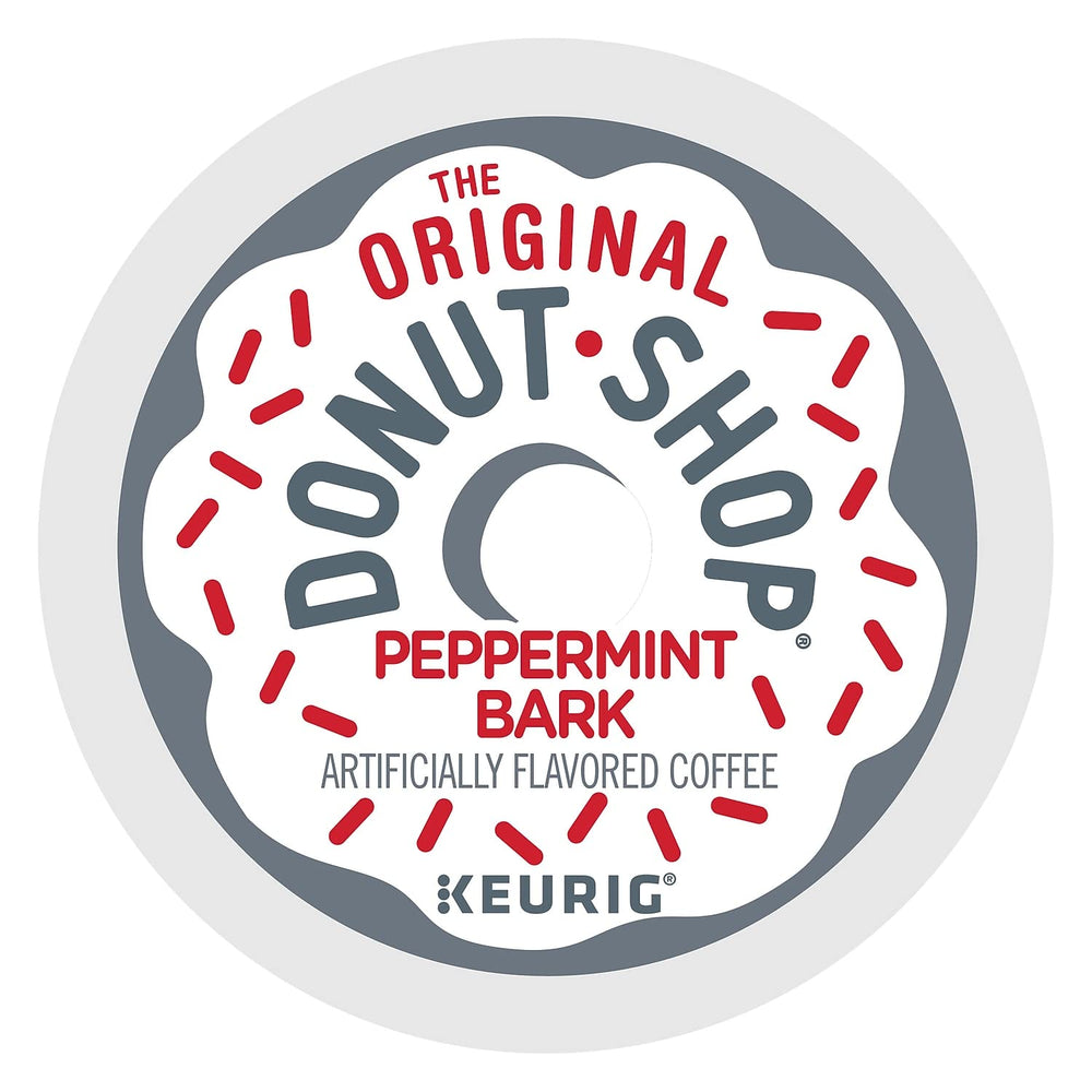 The Original Donut Shop Peppermint Bark K-Cup pods close-up, showcasing creamy white chocolate and peppermint notes.