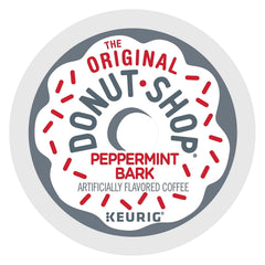 The Original Donut Shop Peppermint Bark K-Cup pods close-up, showcasing creamy white chocolate and peppermint notes.