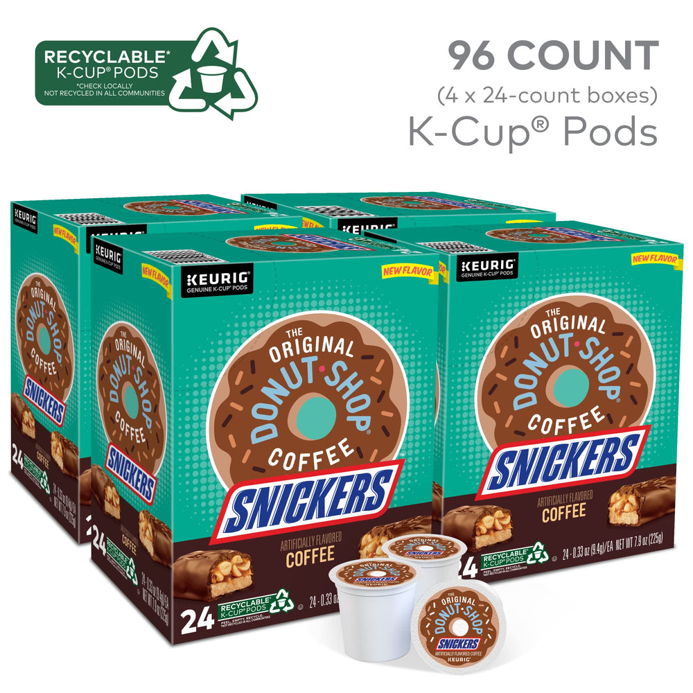 A Snickers coffee cup being poured into a mug for a fresh cup