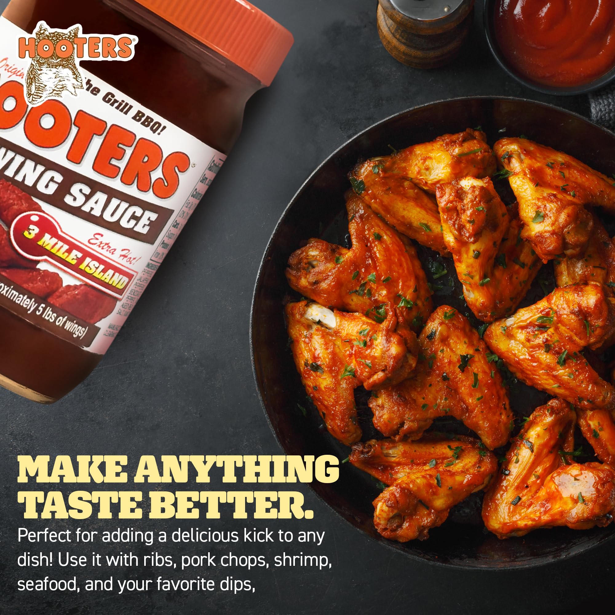 The Original Hooters 3 Mile Island sauce on a kitchen counter ready for wings.
