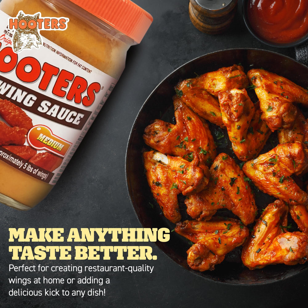 Dipping plate featuring The Original Hooters Medium Wing Sauce.