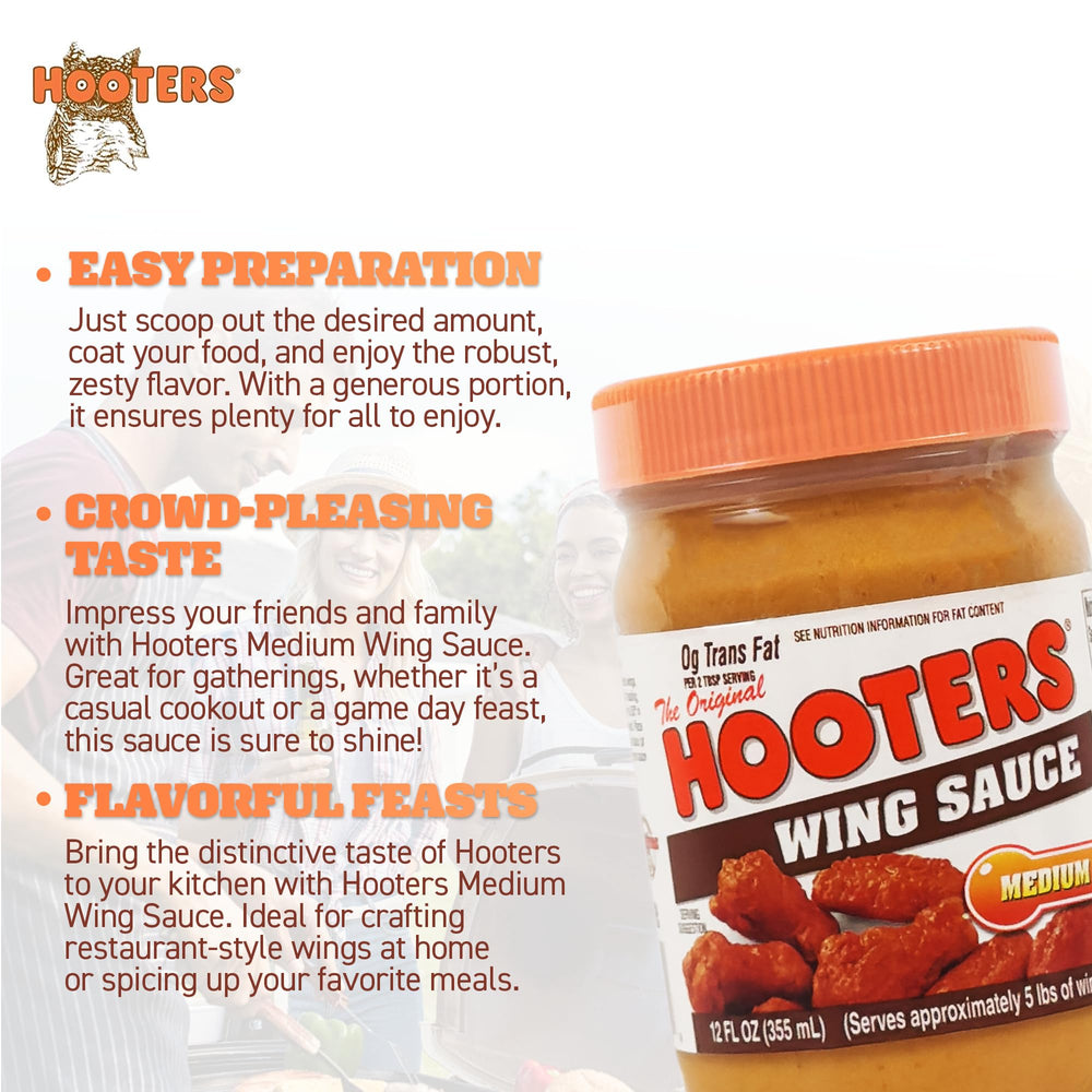 Finished plate with ribs and seafood, The Original Hooters Medium Wing Sauce.