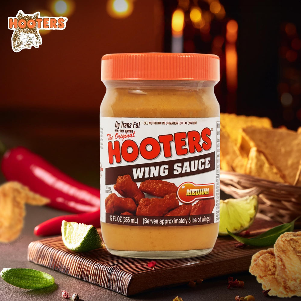 The Original Hooters Medium Wing Sauce label close-up highlighting premium ingredients.