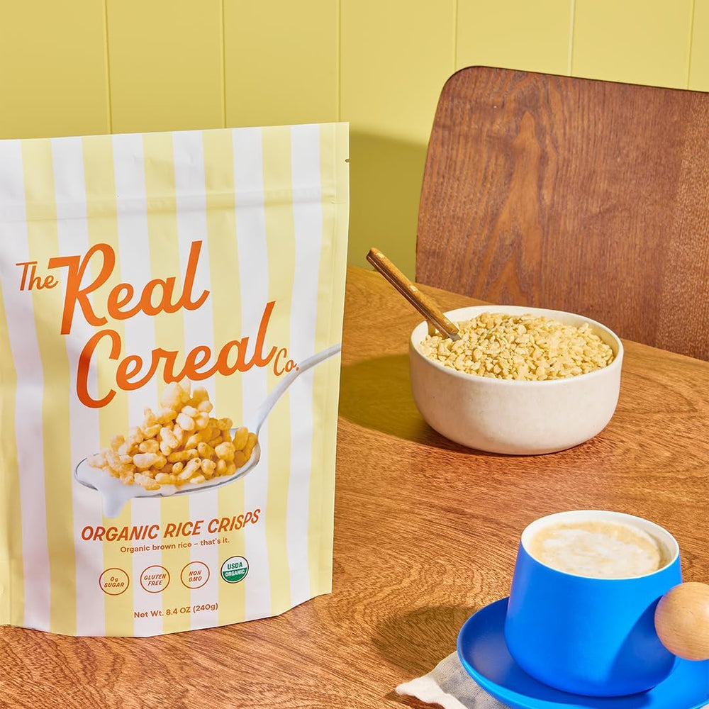 Gluten-free and non-GMO branding on The Real Cereal Company's brown rice crisps.
