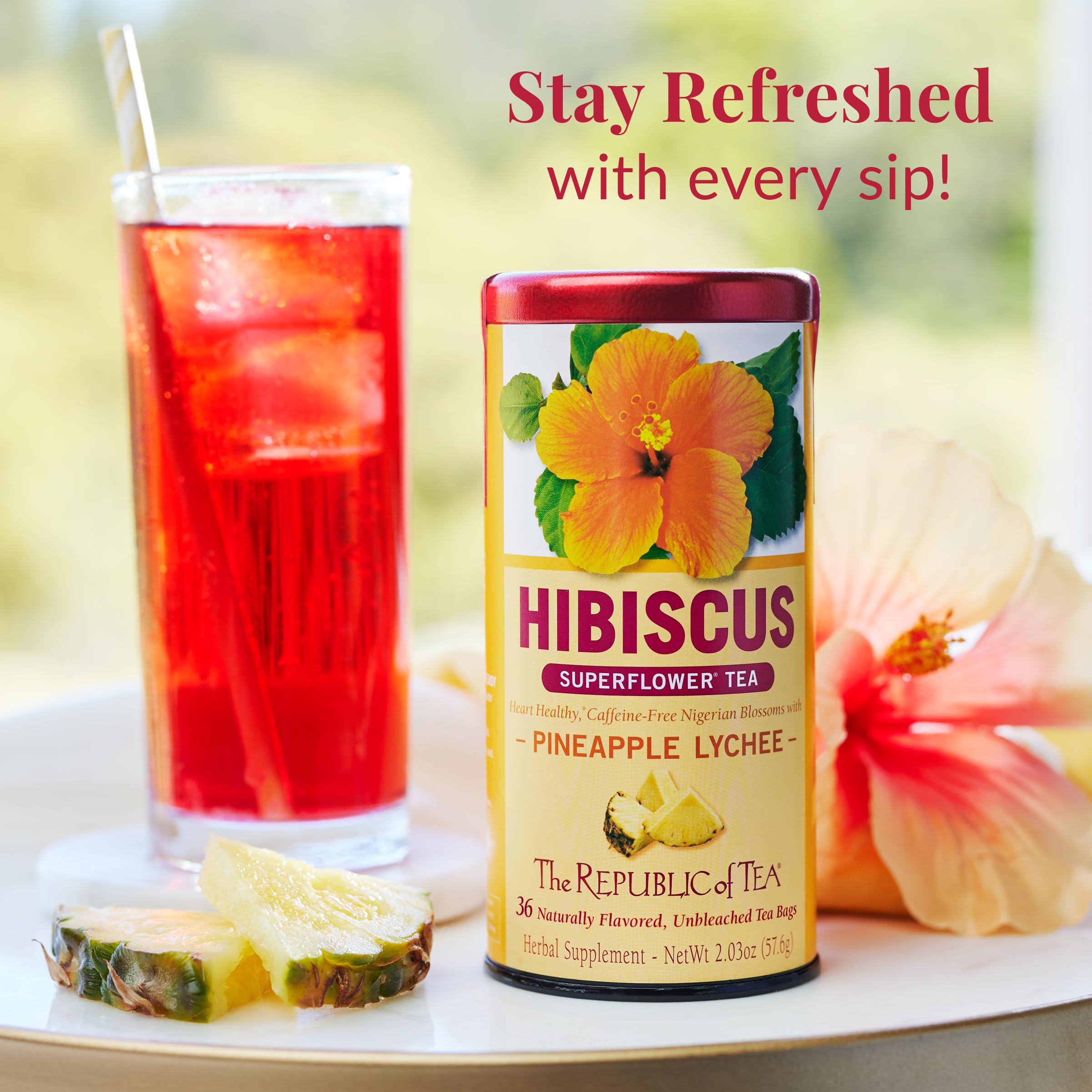 A prepared cup of The Republic of Tea Pineapple Lychee Hibiscus herbal tea.