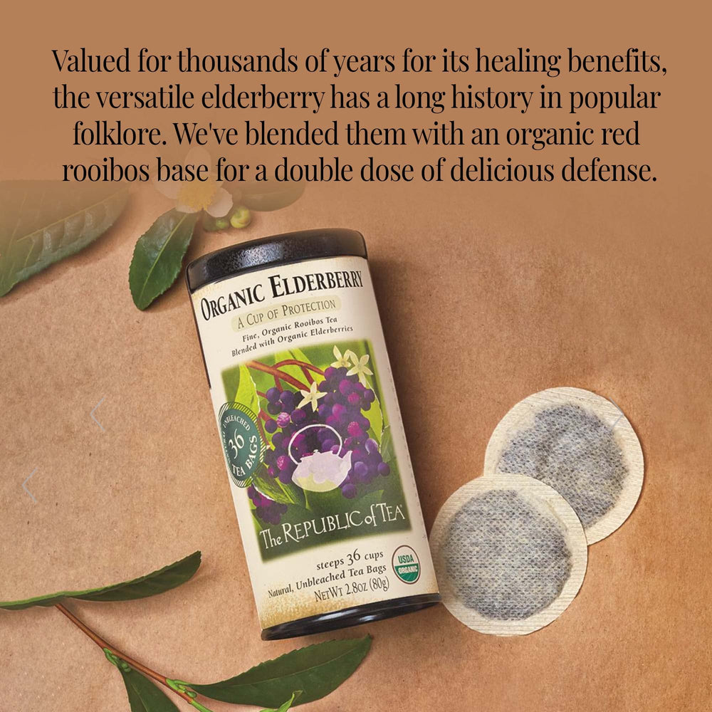 Close-up of elderberries, hibiscus, and rooibos in The Republic of Tea elderberry herbal blend, rich aroma.