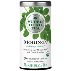 The Republic of Tea Moringa SuperHerb tea tin front view with caffeine-free promise.