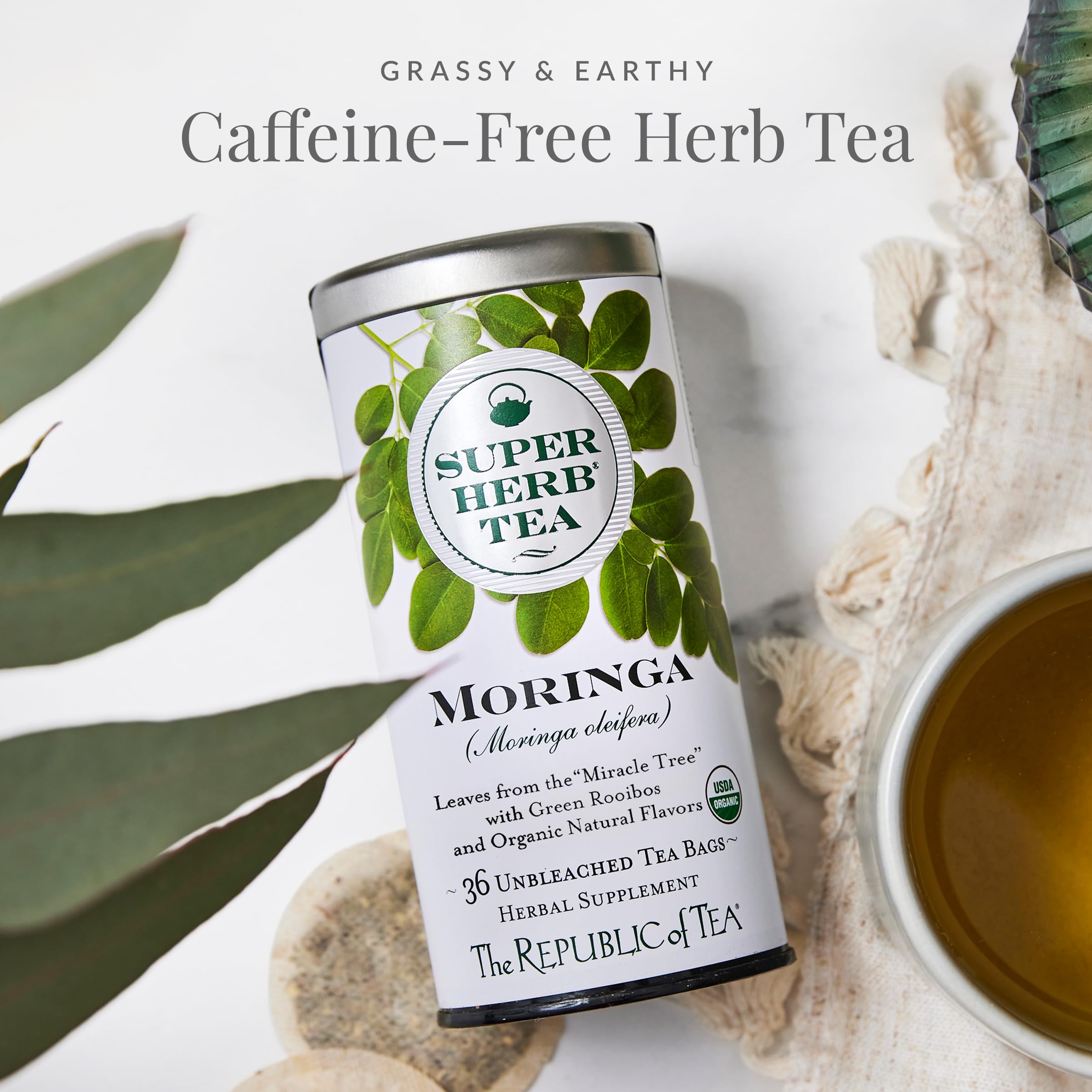 The Republic of Tea Moringa SuperHerb tin label closeup highlights organic ingredients.