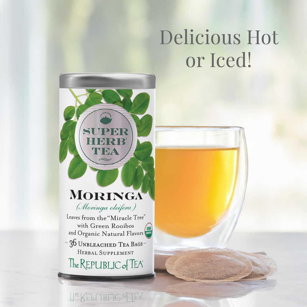 The Republic of Tea Moringa SuperHerb tin open with tea bags ready.