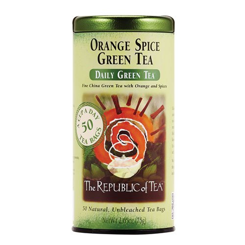 The Republic of Tea Orange Spice Green Tea cup steaming with citrus spice aroma.