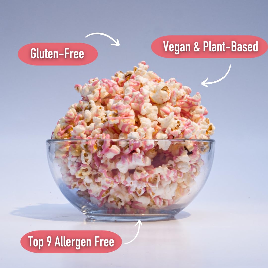 The Safe + Fair Strawberry Shortcake Drizzled Kettle Corn in a bowl—perfect movie-night treat.