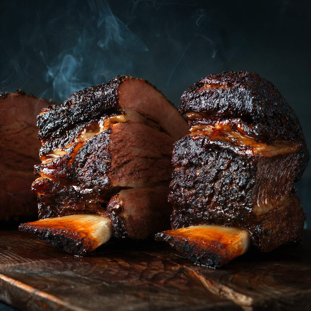 Steak-seasoned close-up suggests premium finish and even coating