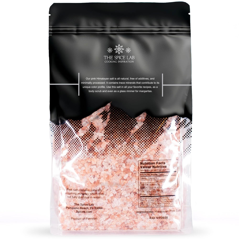 The Spice Lab Pink Himalayan Salt grinder refill with coarse grains for precise flavoring.