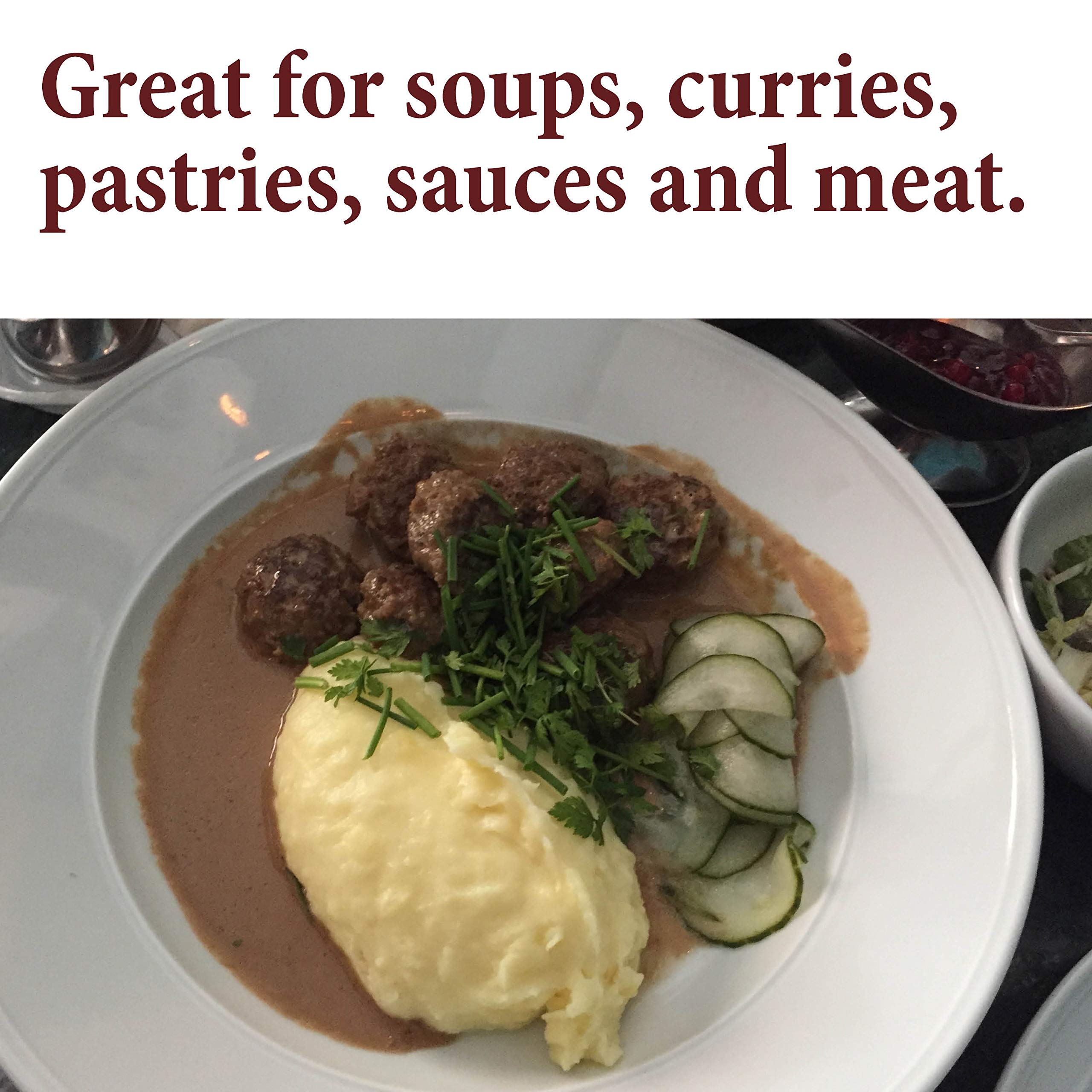 The Spice Way Allspice ground in a kitchen scene with curries, perfect for bold flavor.