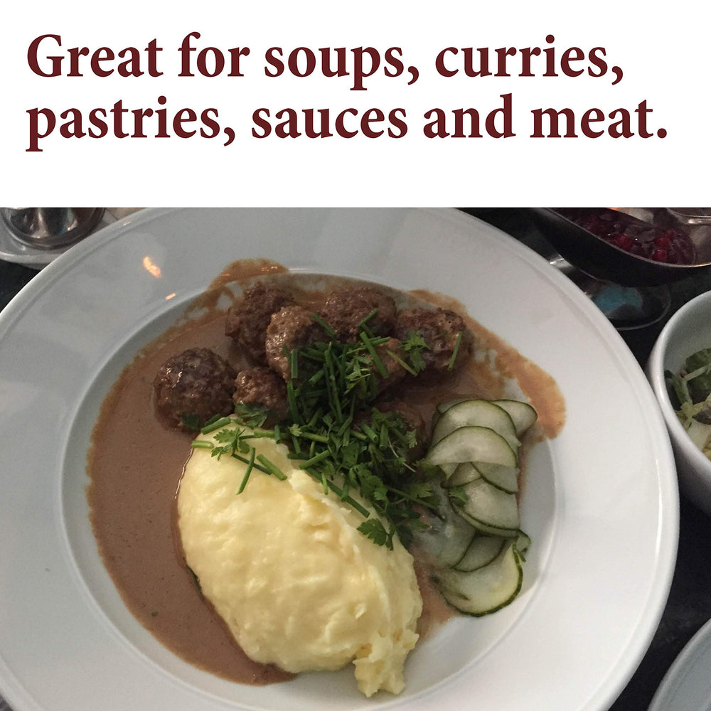 The Spice Way Allspice ground in a kitchen scene with curries, perfect for bold flavor.