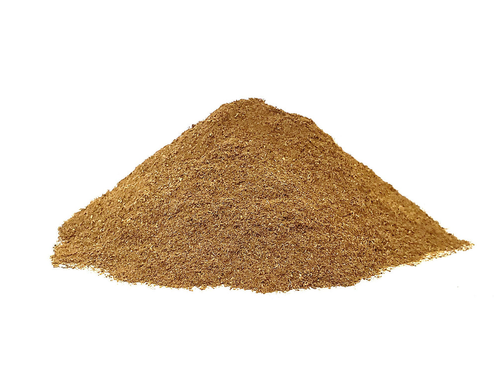 The Spice Way clove powder used in a cup for a warm tea infusion.