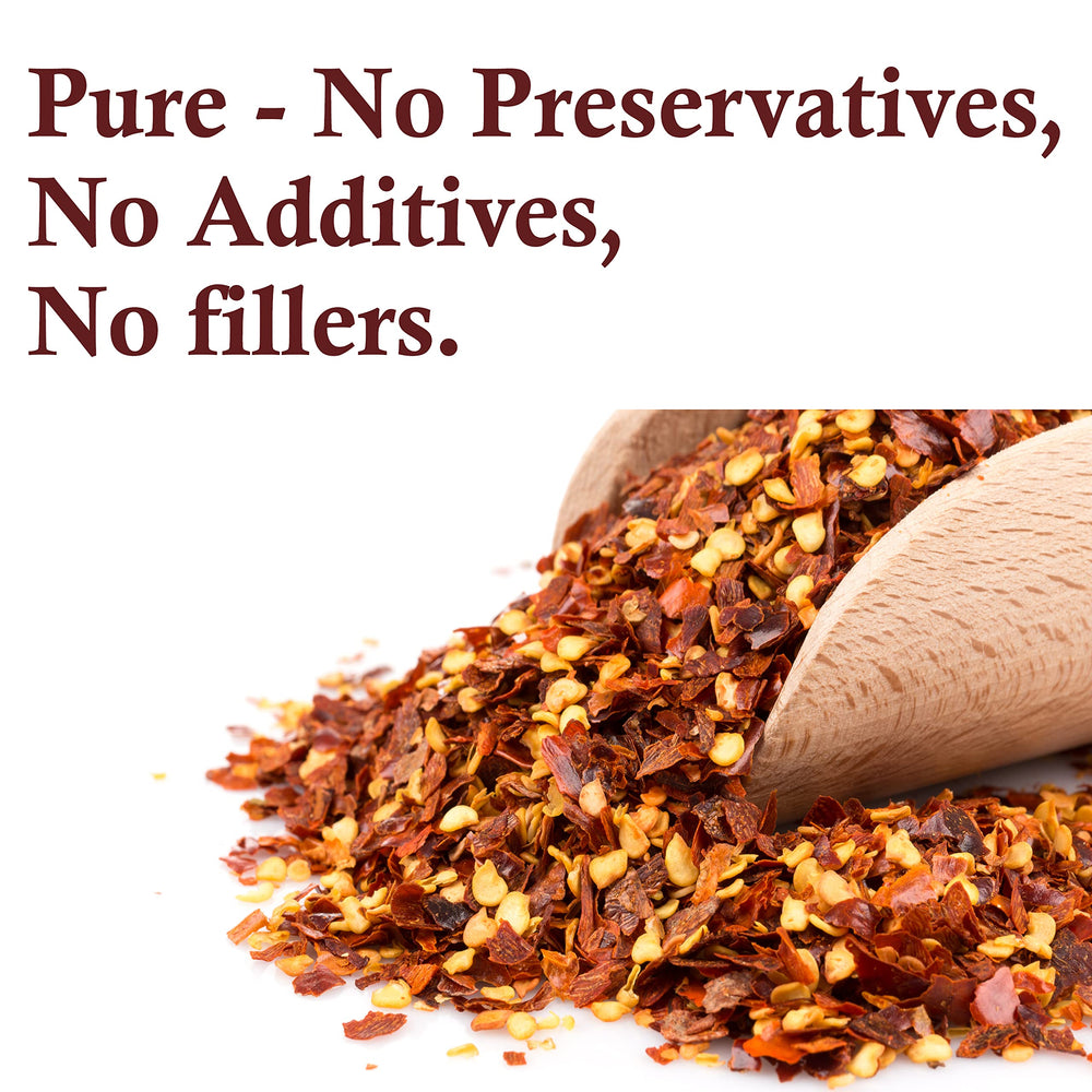The Spice Way Crushed Red Pepper Flakes on shelf display shows premium seasoning.