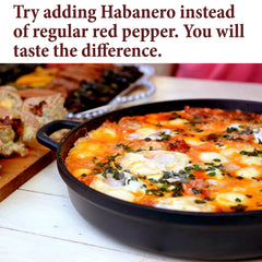 The Spice Way habanero ground pepper closeup reveals vibrant flakes and aroma.