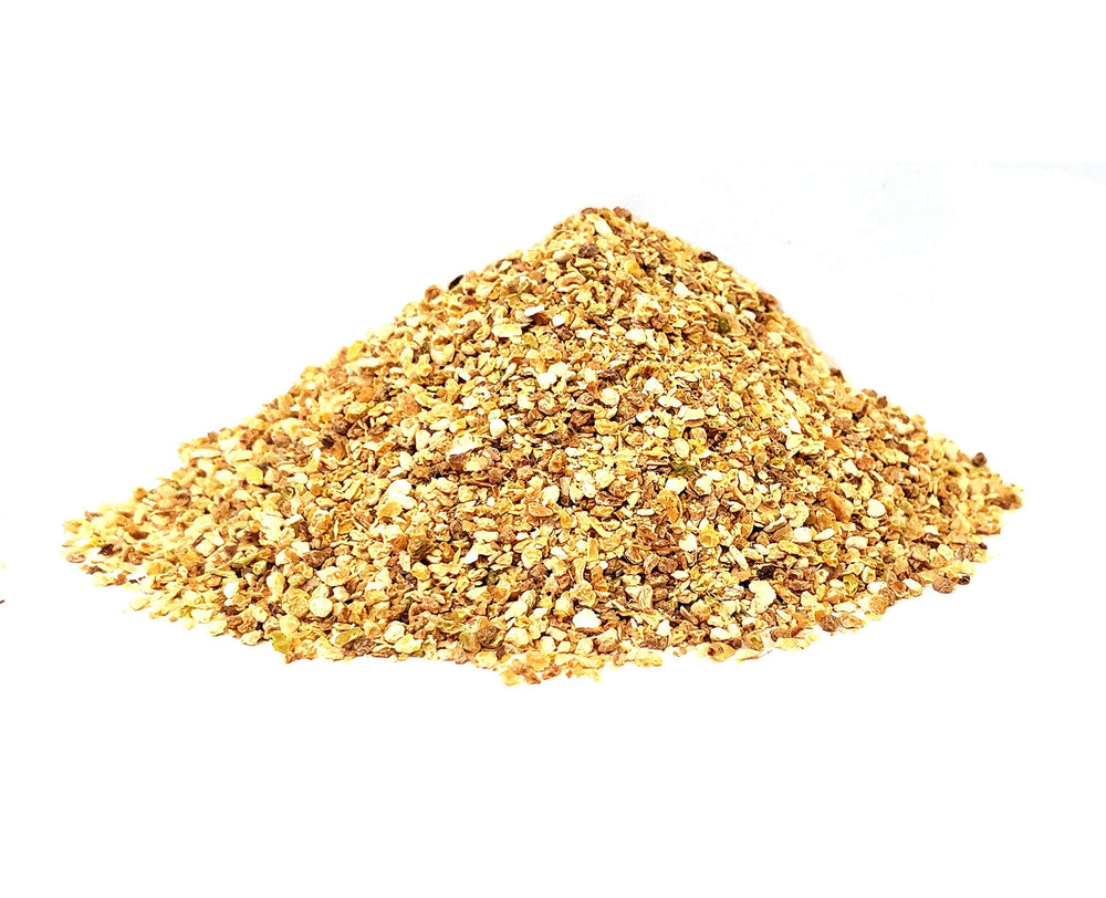 The Spice Way lemon peel granules bottle on kitchen counter suggests farm-to-table heritage