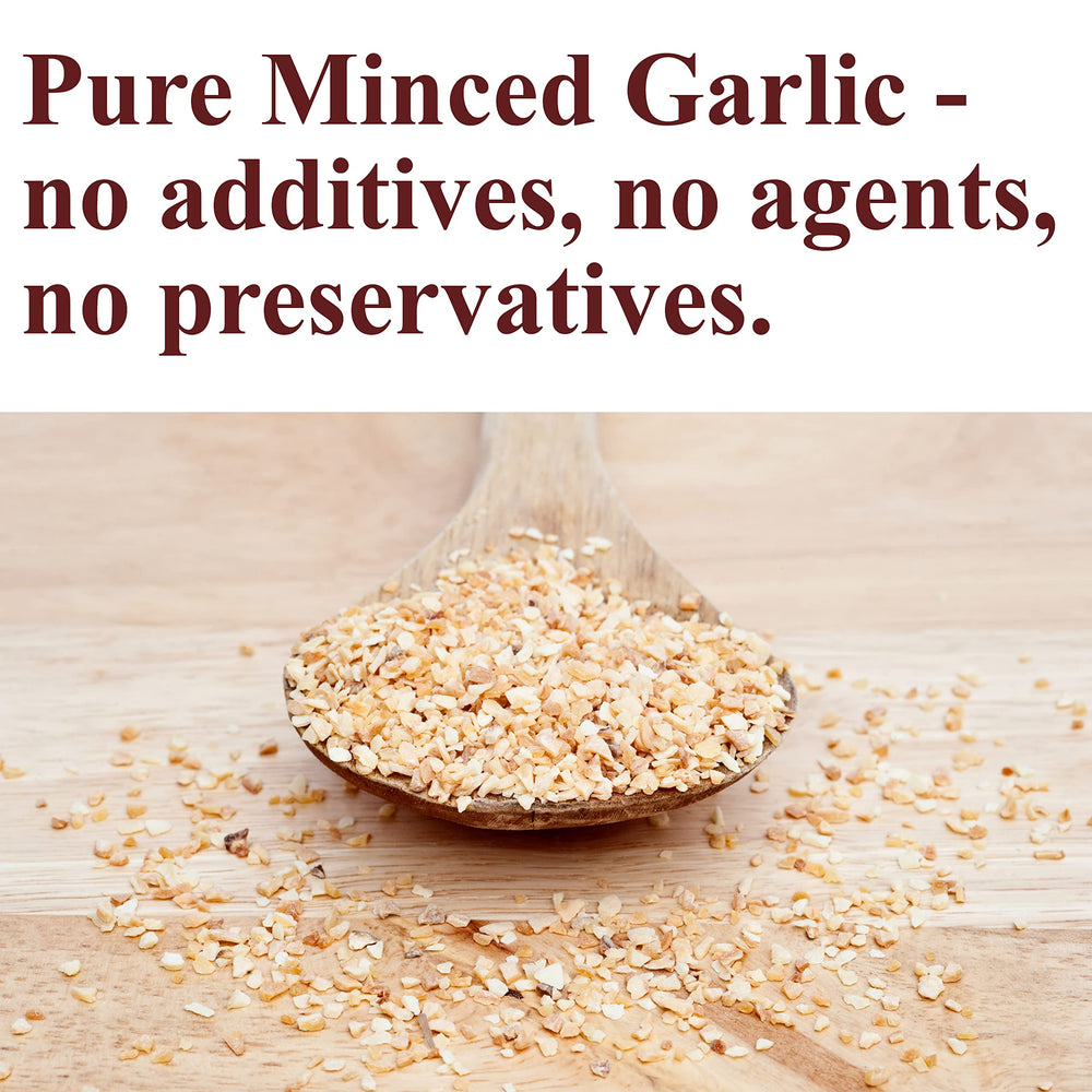 The Spice Way minced garlic coarse flakes closeup, highlighting texture ideal for sauces.