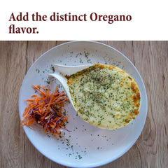 The Spice Way oregano leaves added to a dish for herbaceous, peppery seasoning.