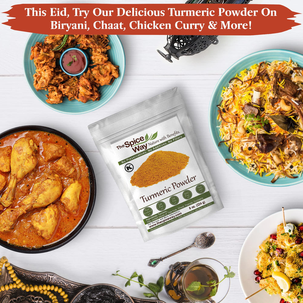 Turmeric powder over a curry dish in a vivid golden sauce with The Spice Way brand.