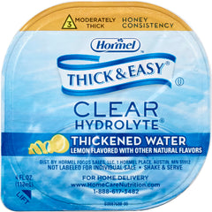 Pouring Thick & Easy Hydrolyte thickened water from a bottle for controlled thickness