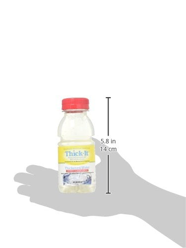 Thick-It Clear Advantage pouring into a glass to show colorless liquid.