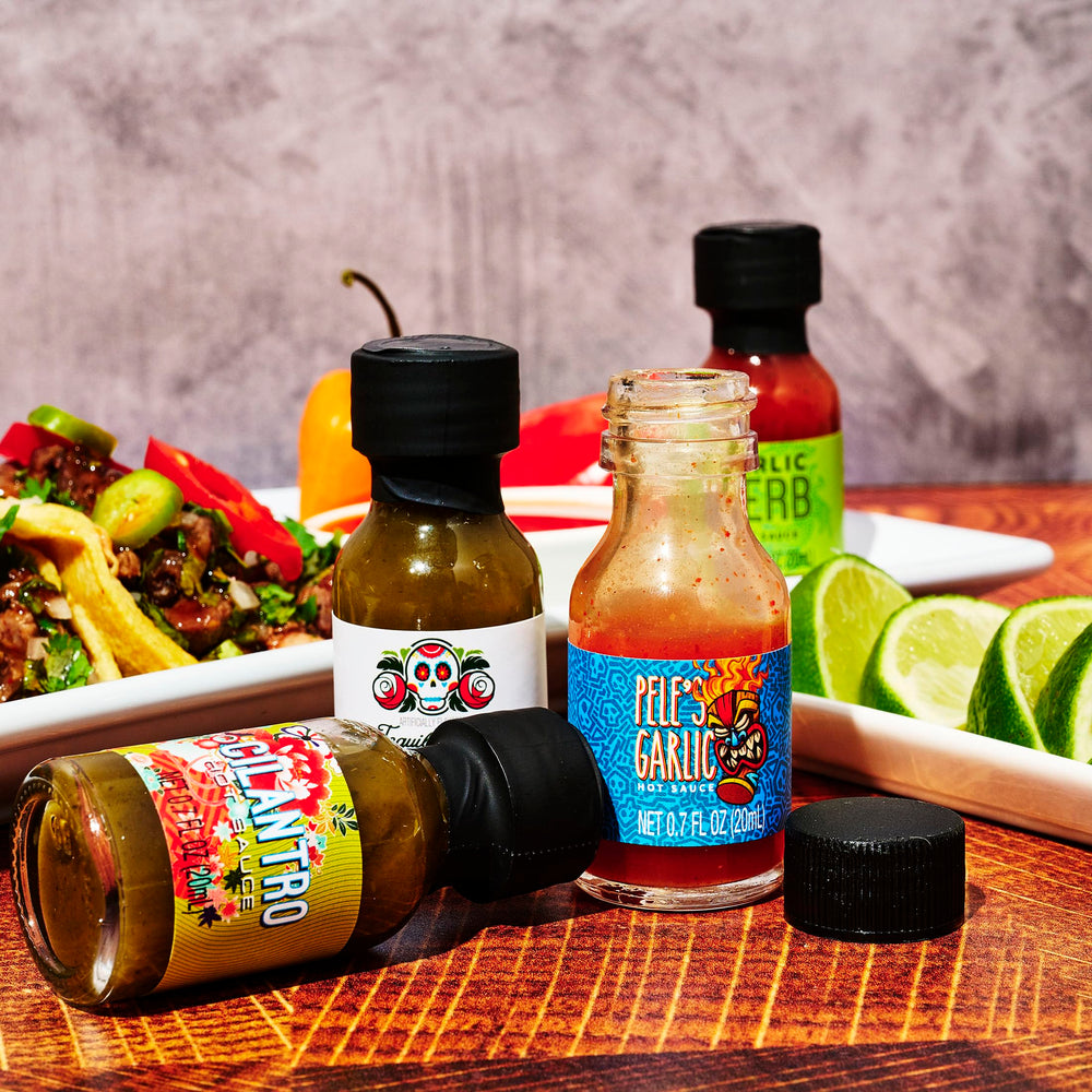 Thoughtfully Gourmet cayenne hot sauce bottle, versatile heat for chili and pizza.