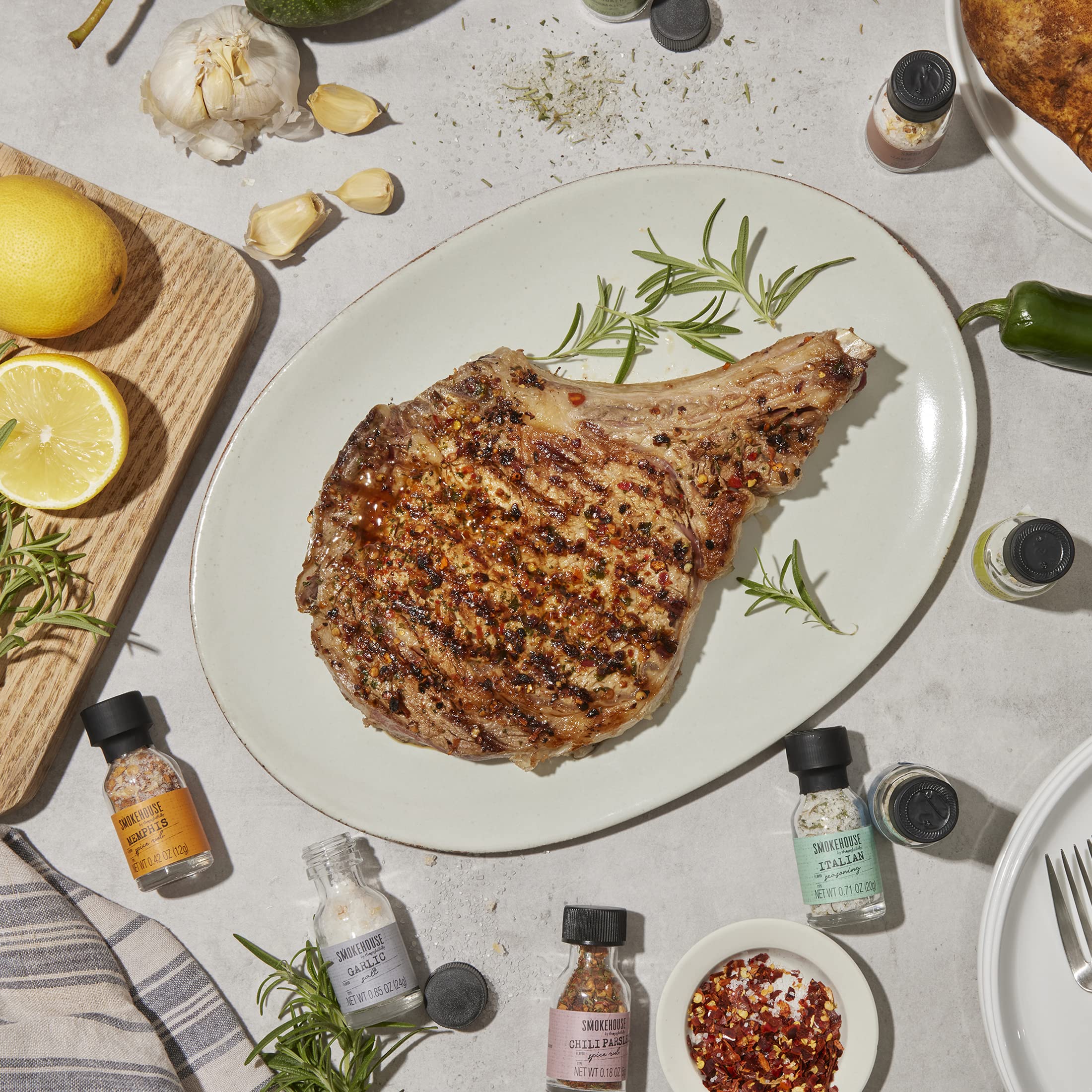 Thoughtfully Smokehouse Garlic Salt bottle enhances flavor in potatoes
